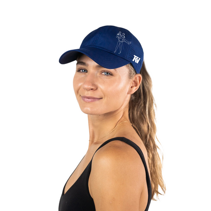 T holding K Ponytail Caps