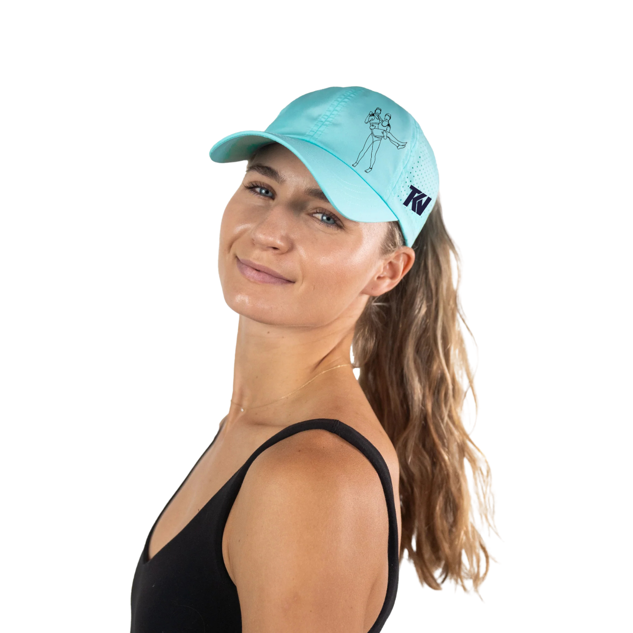 T holding K Ponytail Caps