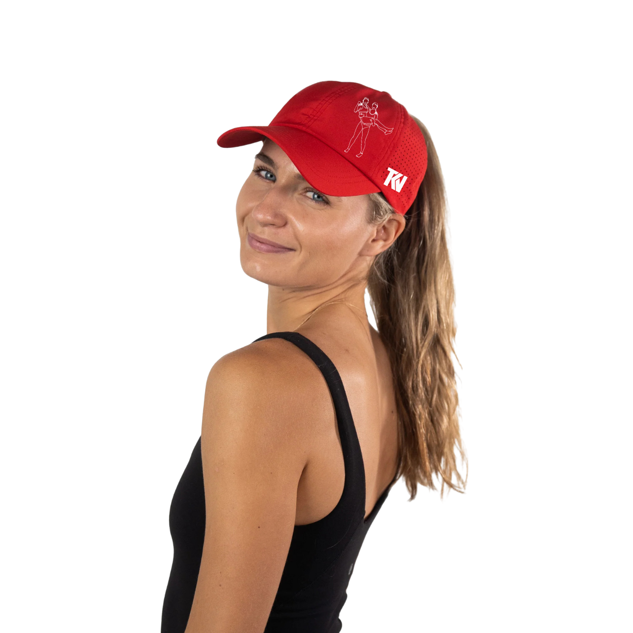 T holding K Ponytail Caps